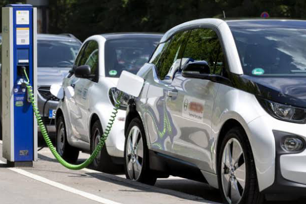 Charging Modern Electric Cars On The Street Station